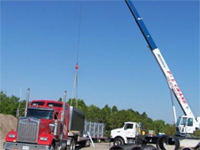 Our 40 ton crane next to a truck.